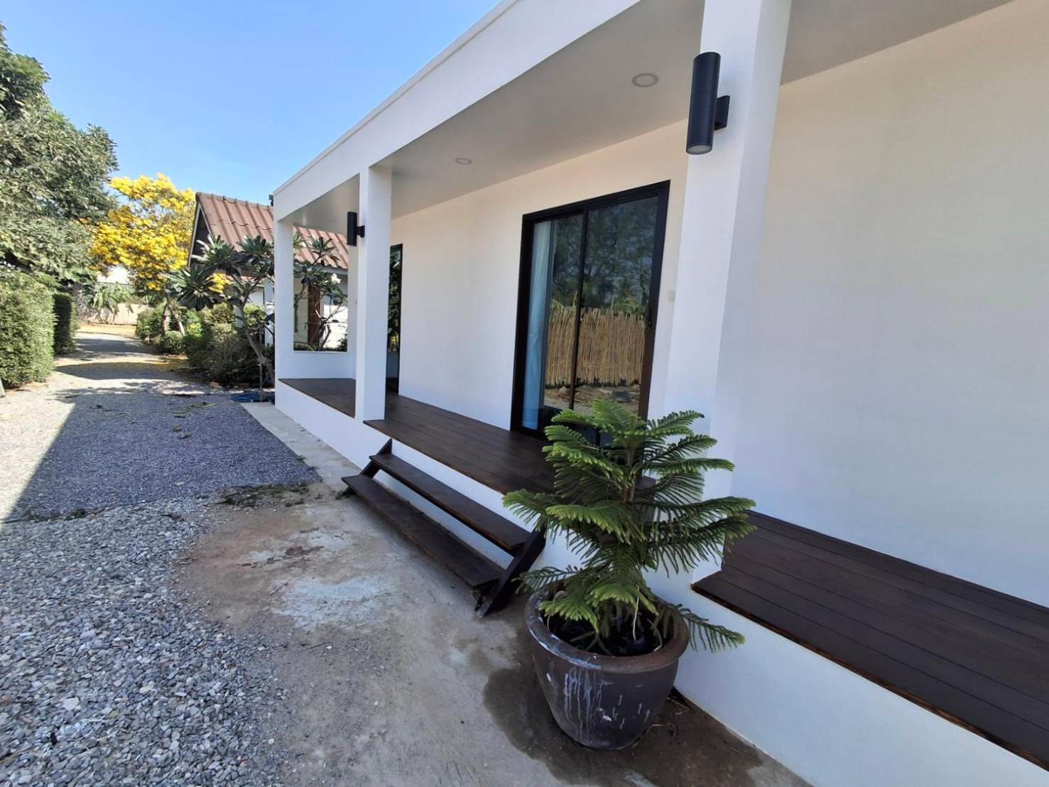 Appartement Homlomchomsuan หอมลมชมสวน à Ban Mai  Extérieur photo