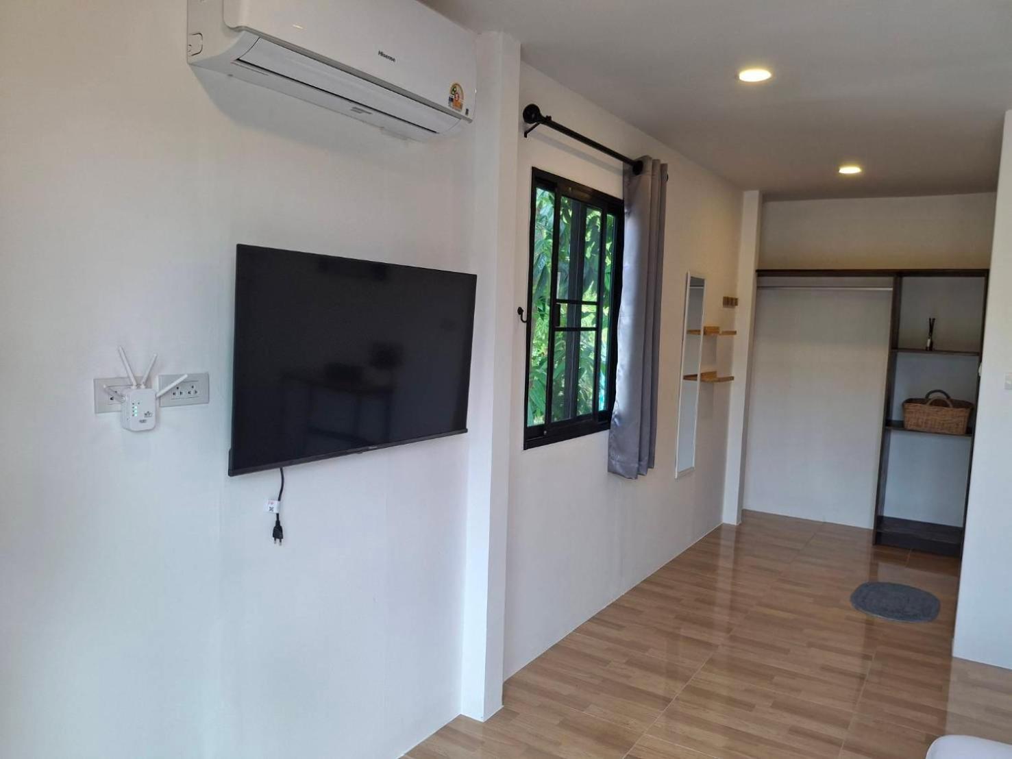 Appartement Homlomchomsuan หอมลมชมสวน à Ban Mai  Chambre photo