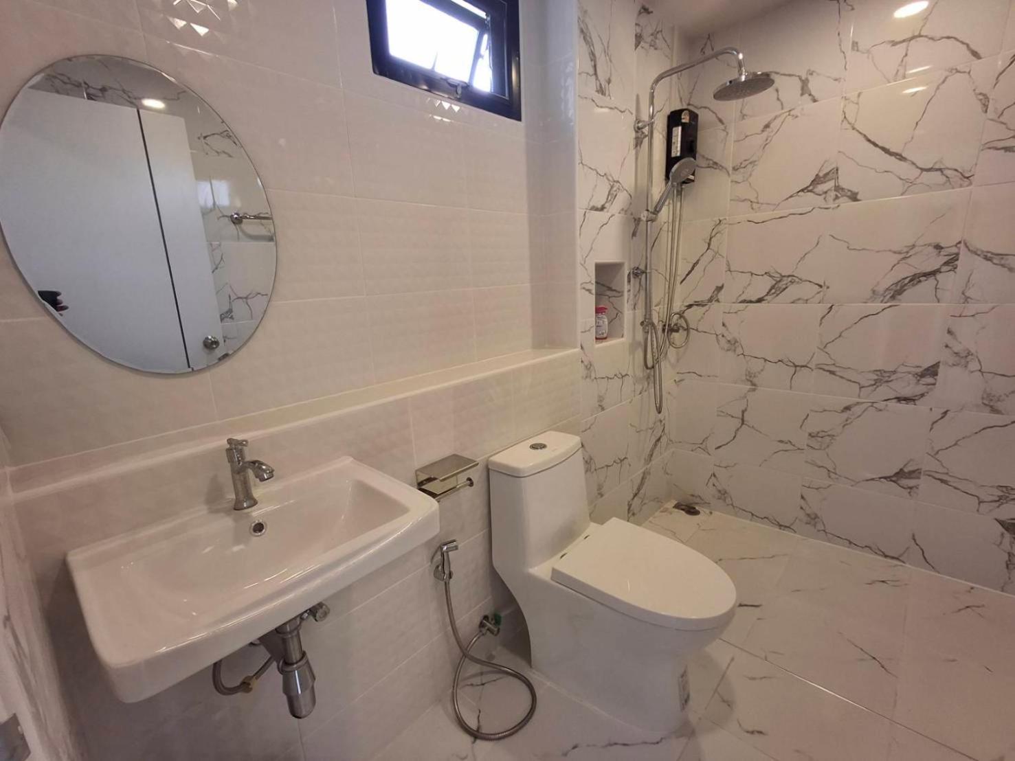 Appartement Homlomchomsuan หอมลมชมสวน à Ban Mai  Chambre photo